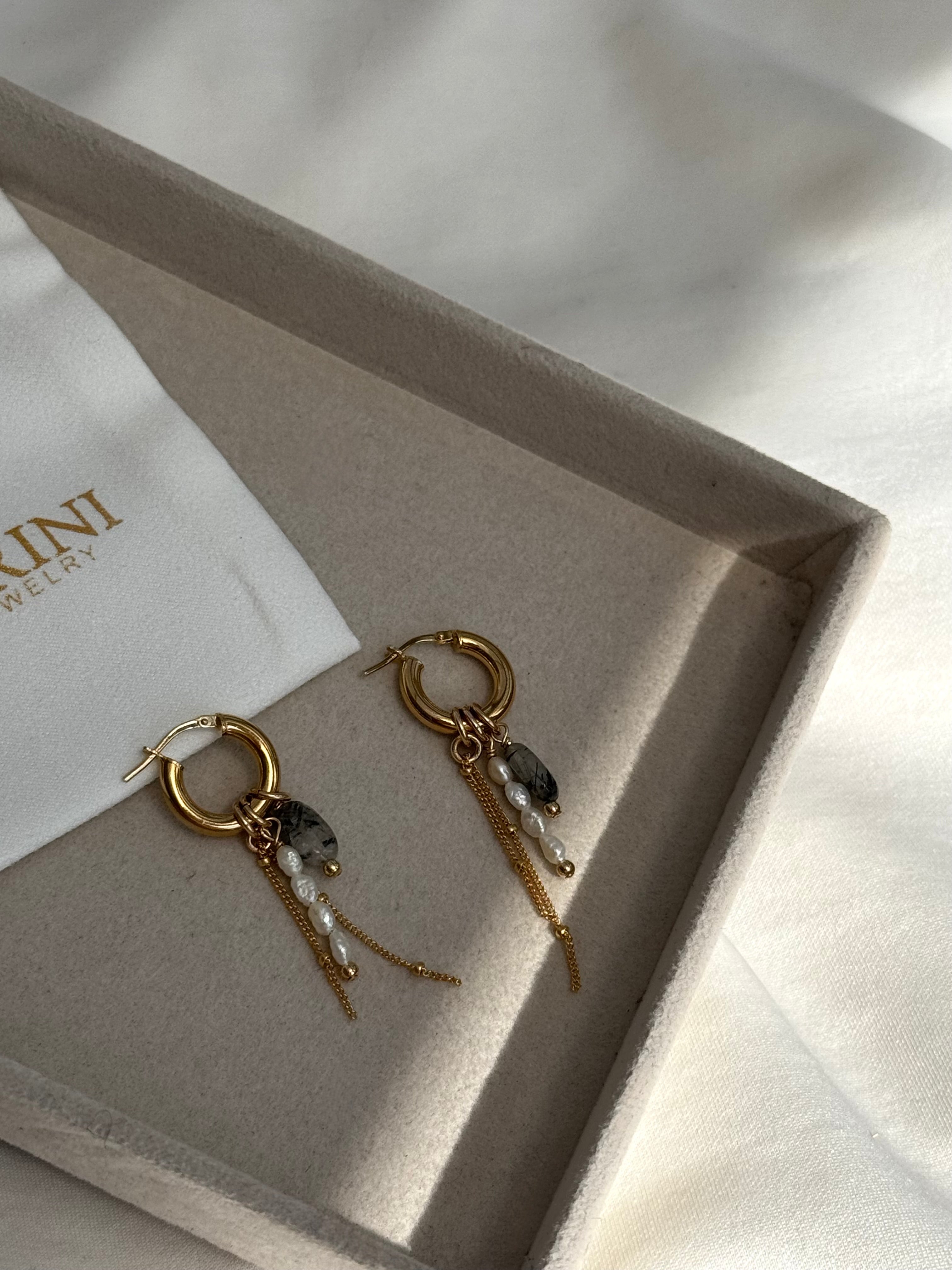 עגילי חישוק טוויסט זהב